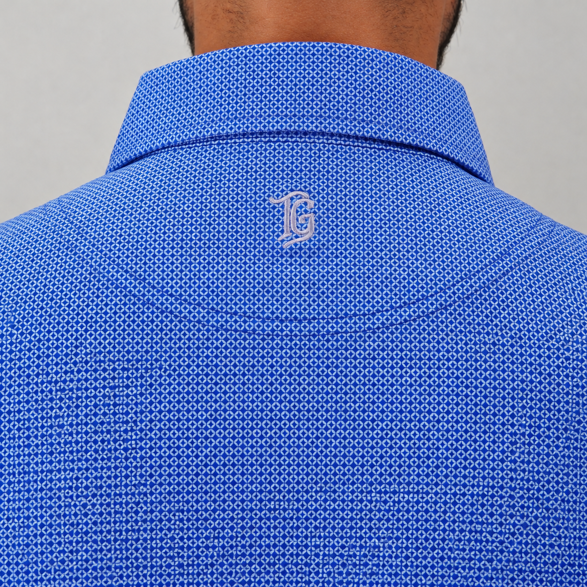 Trash Golf Polo in Blue Geo, back