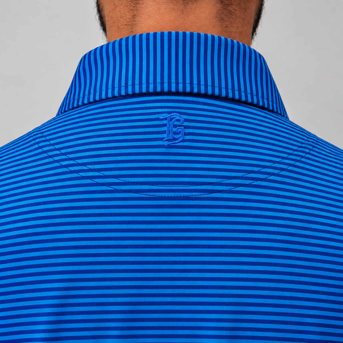 Trash Golf Polo in Stripe, back